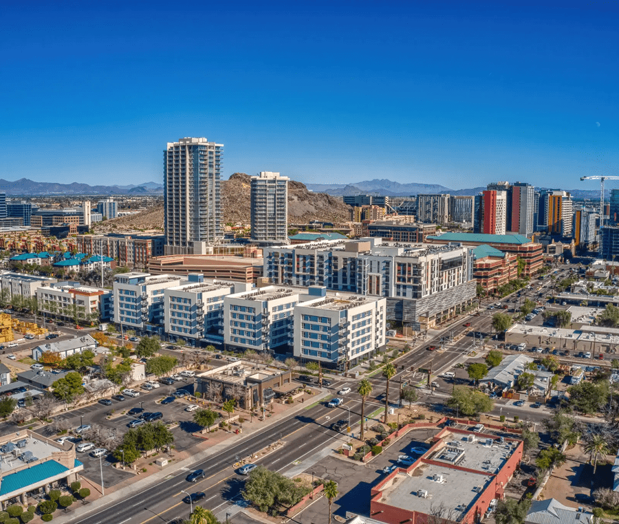 Cityscape with modern buildings and mountains